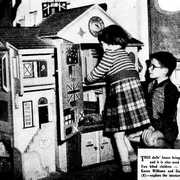 Children playing with a doll's house at Wyadra Hostel